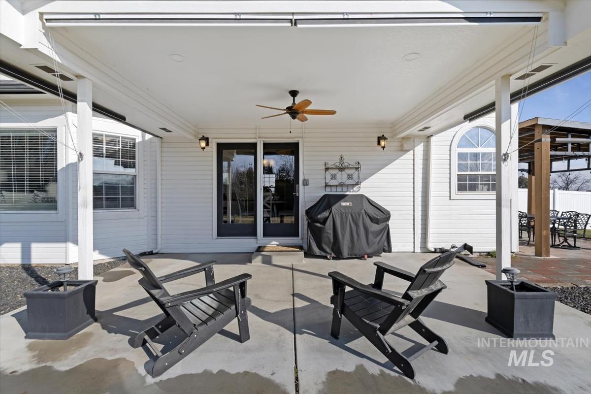 14111 Towers Drive Caldwell, ID 83607 - Photo 29 of 50 View of patio featuring ceiling fan and grilling area