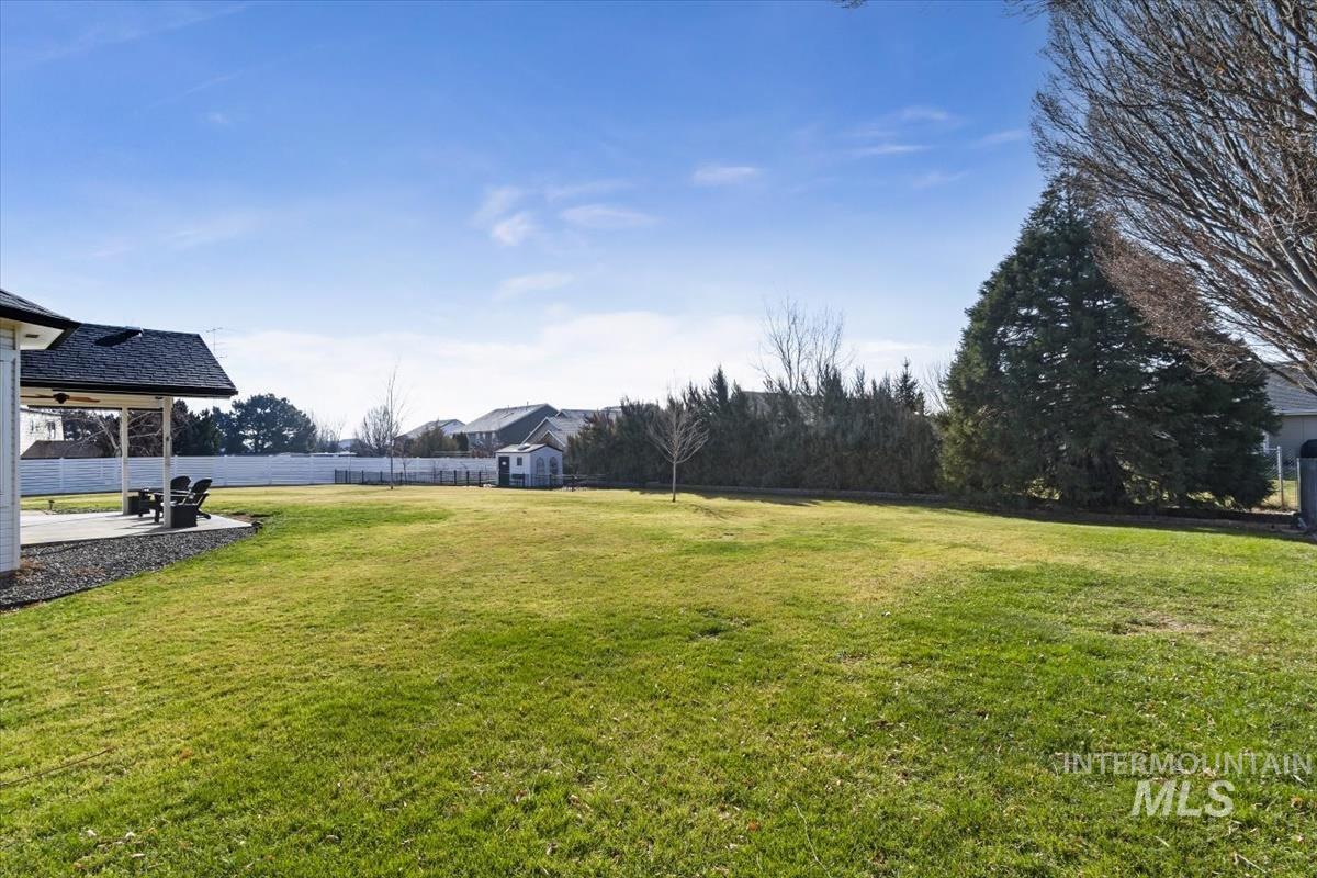14111 Towers Drive Caldwell, ID 83607 - Photo 30 of 50 View of yard featuring a patio area
