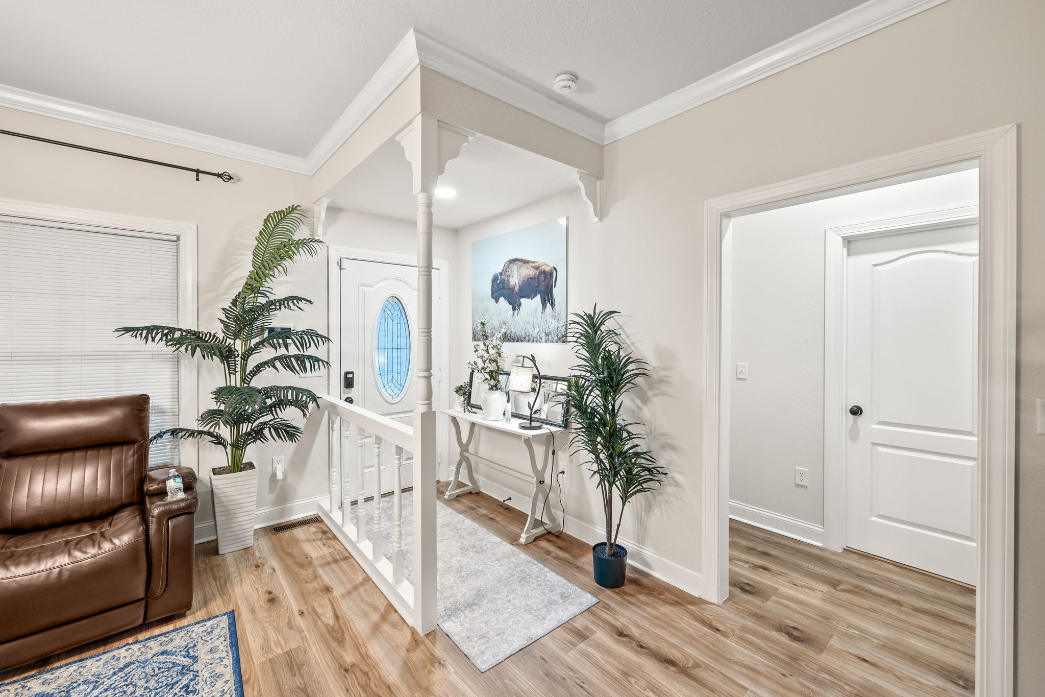 1309 Bridle Path Cookeville, TN 38501 - Photo 11 of 32 a living room with furniture and a potted plant