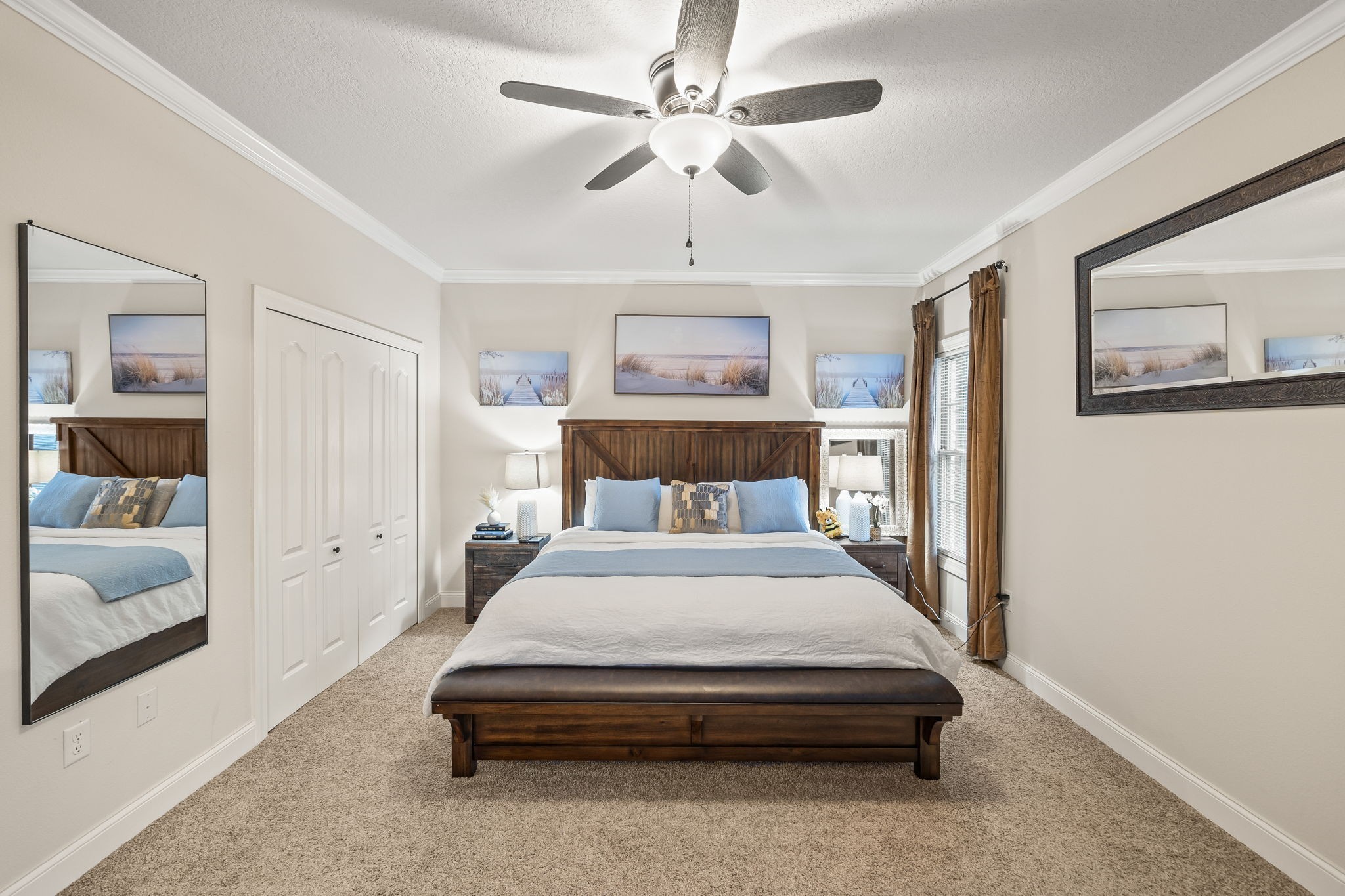 1309 Bridle Path Cookeville, TN 38501 - Photo 12 of 32 a bedroom with a large bed and a chandelier