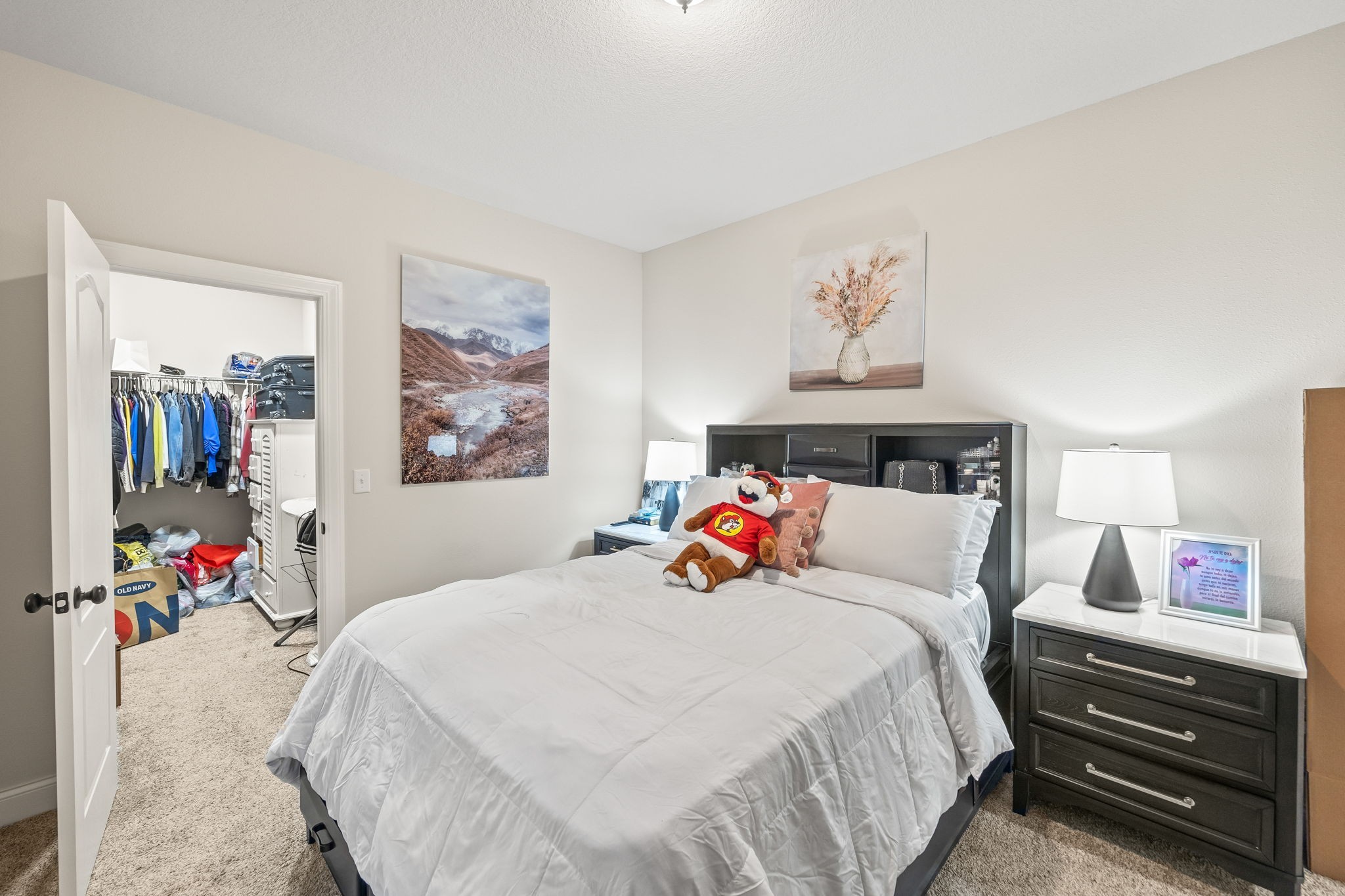 1309 Bridle Path Cookeville, TN 38501 - Photo 16 of 32 a bedroom with a bed and a large mirror on a dresser