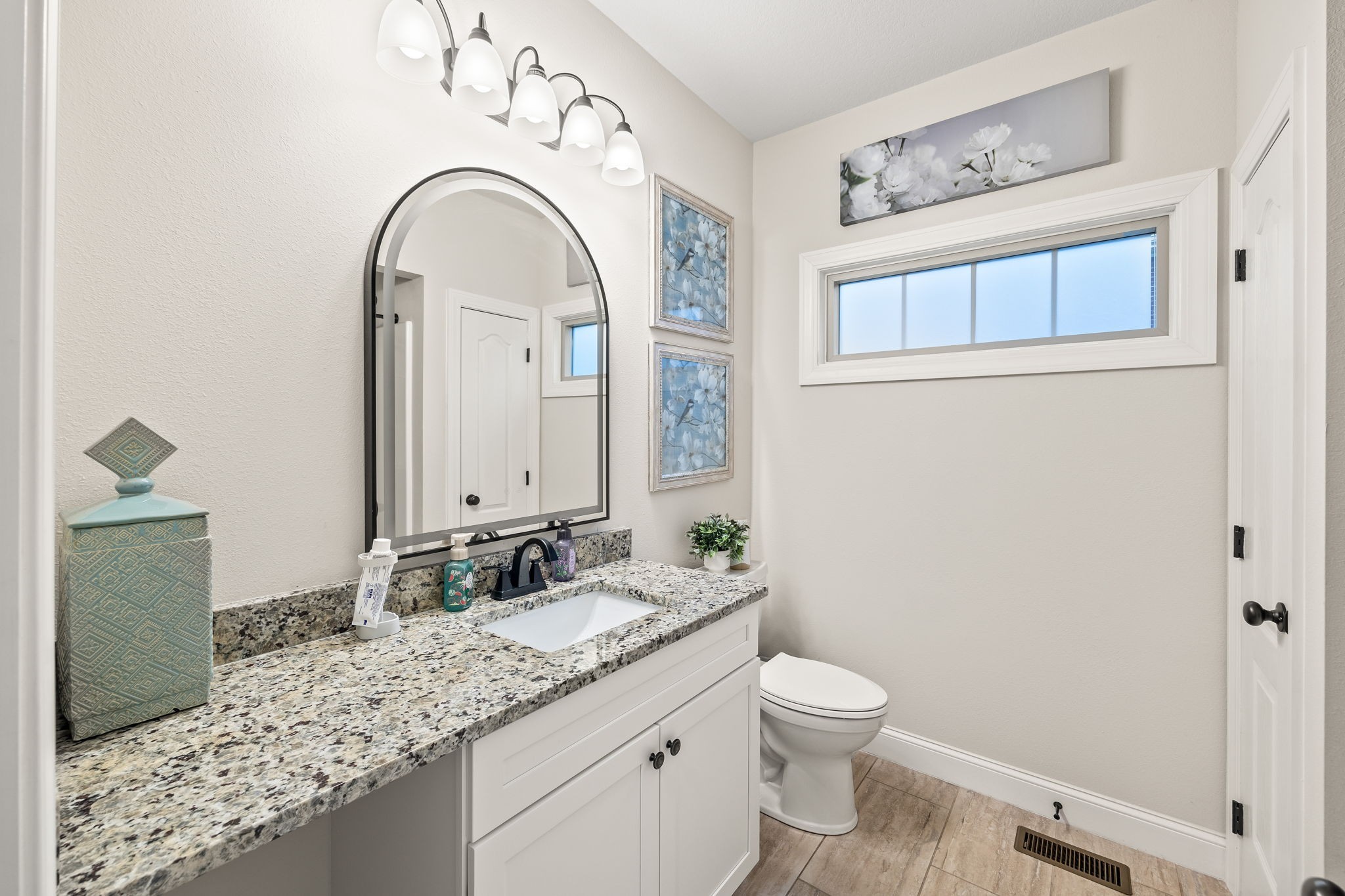1309 Bridle Path Cookeville, TN 38501 - Photo 19 of 32 a bathroom with a granite countertop sink and a mirror