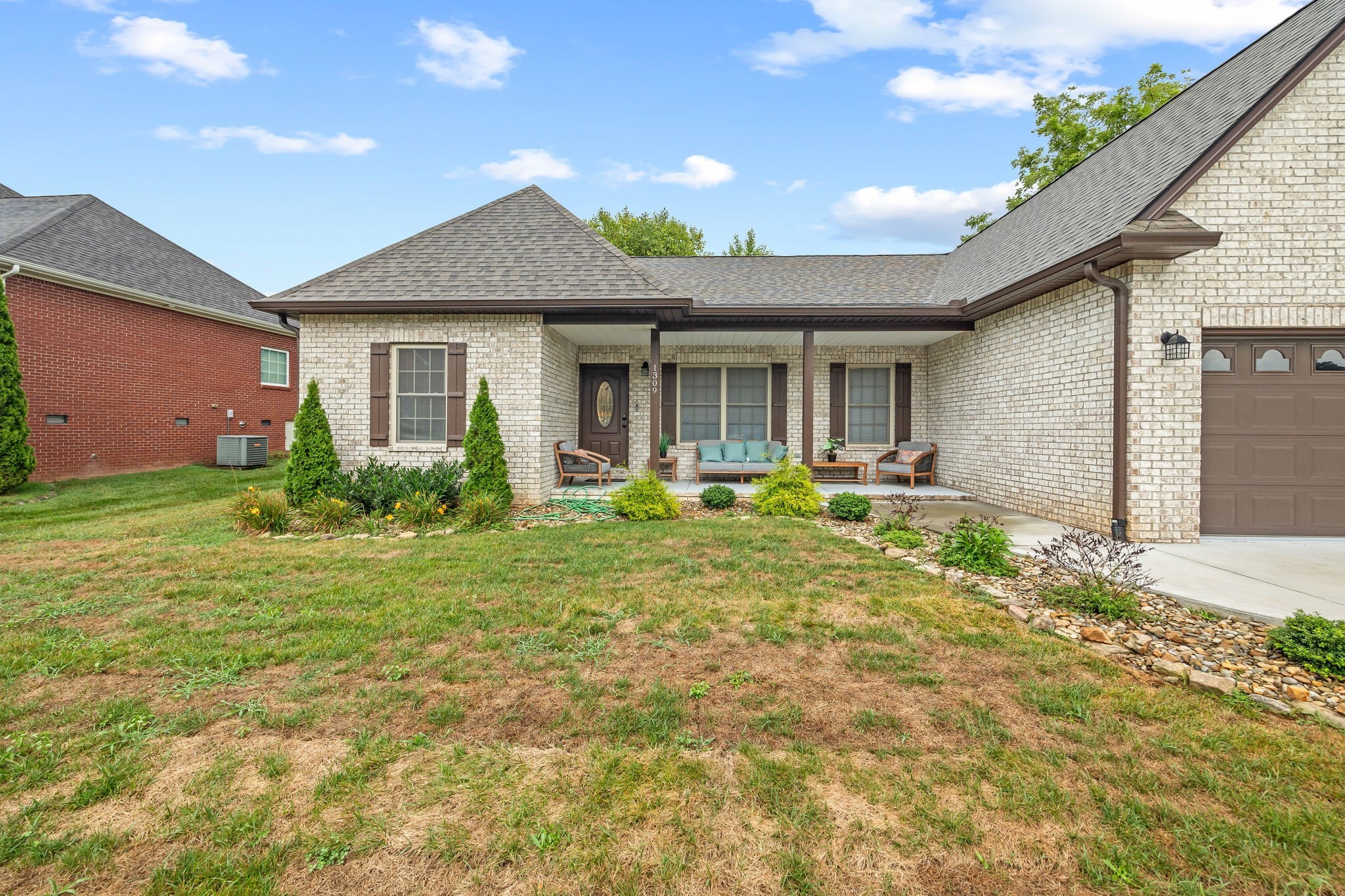 1309 Bridle Path Cookeville, TN 38501 - Photo 22 of 32 a front view of a house with garden