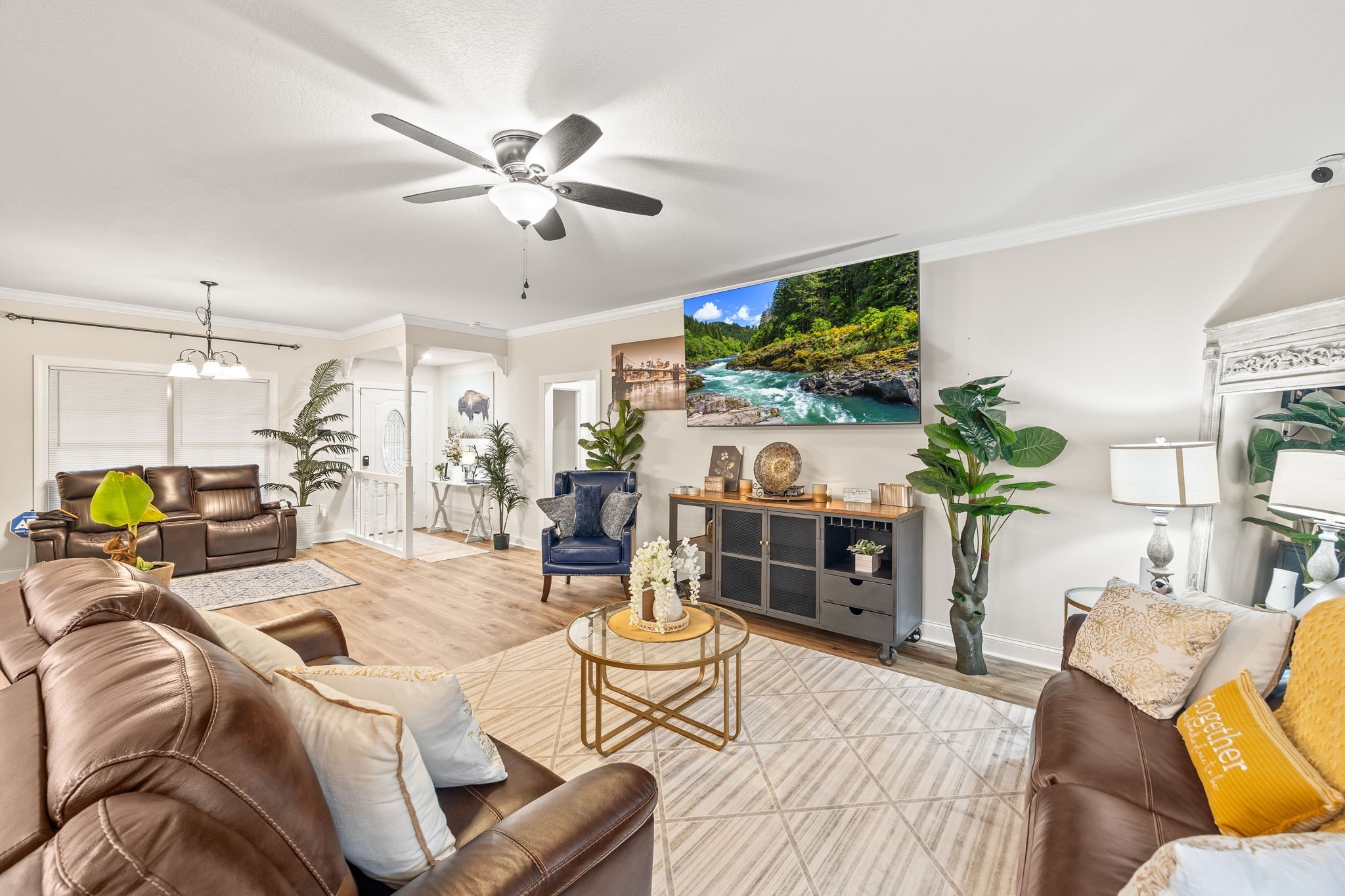 1309 Bridle Path Cookeville, TN 38501 - Photo 5 of 32 a living room with furniture a flat screen tv and a fireplace