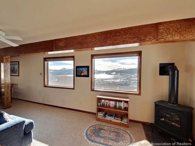 48 AB Road Silverthorne, CO 80498 - Photo 11 of 25 Other. Bonus Room that can be made into another bedroom, 2nd living area, Workout room. or whatever you desire. Long wide area encompassing windows that capture these Amazing Views!!!