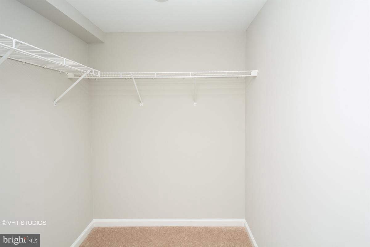 2726 Gallows Road, Unit 1202 Vienna, VA 22180 - Photo 20 of 24 a view of small space with racks on the wall