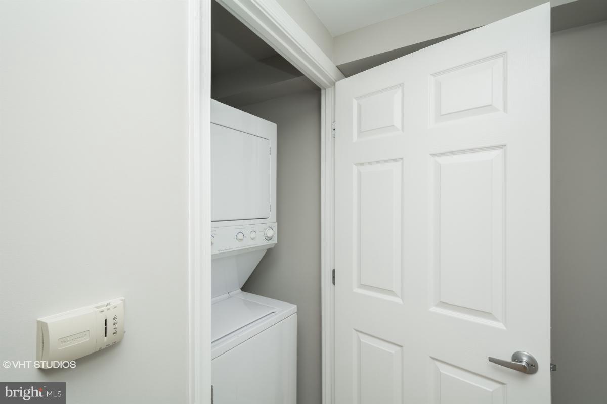 2726 Gallows Road, Unit 1202 Vienna, VA 22180 - Photo 22 of 24 a view of washer and dryer