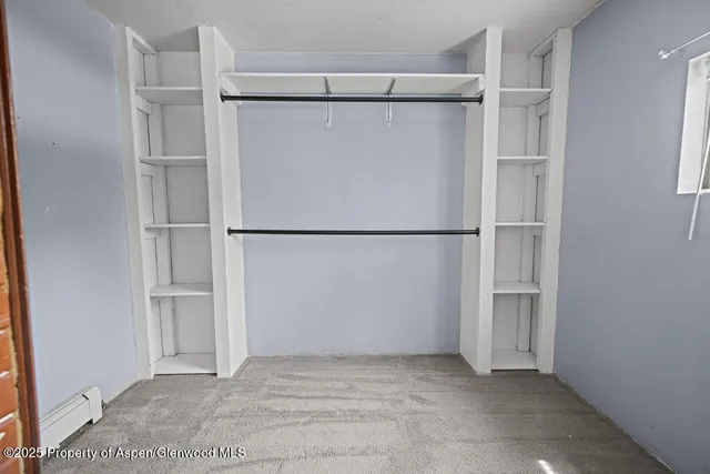 a view of porch with a small yard