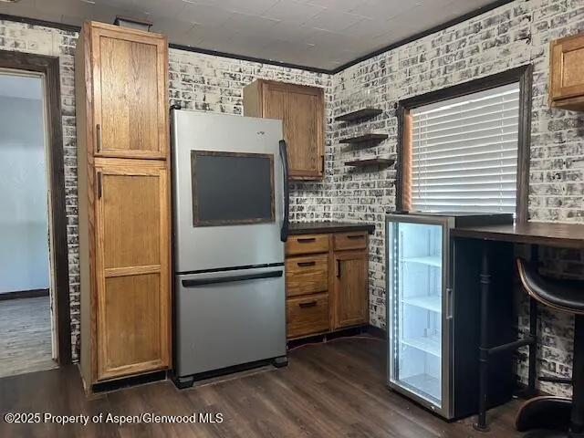 a stove top oven sitting inside of a kitchen