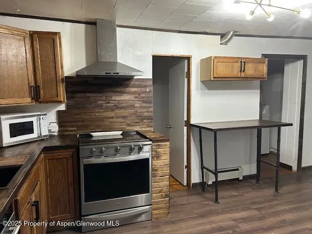 a kitchen with appliances cabinets and a sink
