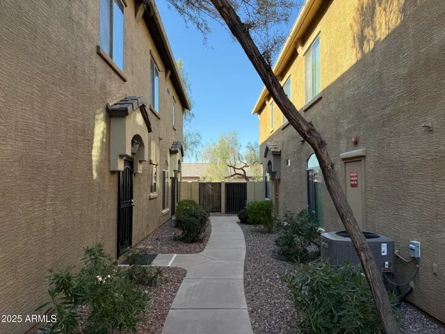 a view of a potted plants in front of a building