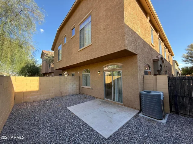 a view of a back yard of the house