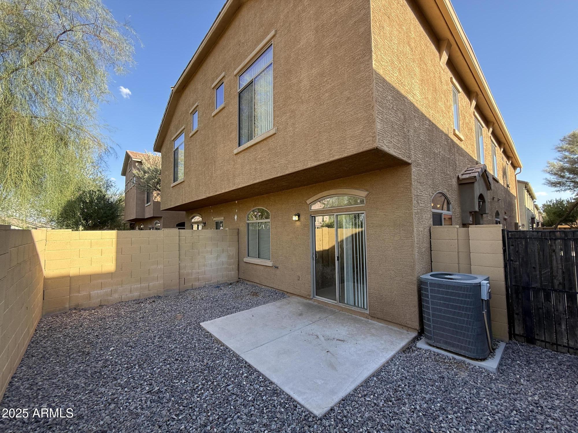 2150 East Bell Road, Unit 1138 Phoenix, AZ 85022 - Photo 31 of 38 a view of a back yard of the house