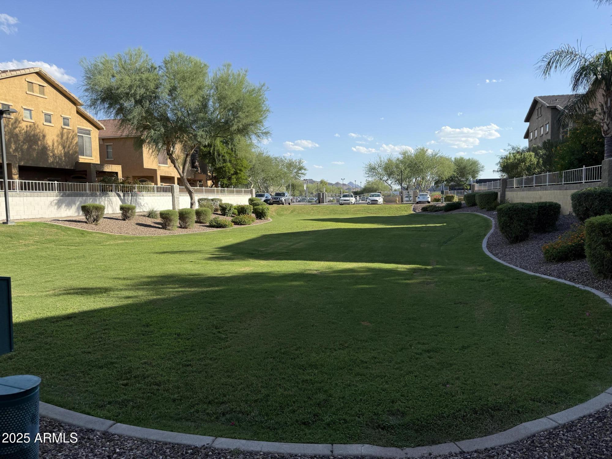 2150 East Bell Road, Unit 1138 Phoenix, AZ 85022 - Photo 38 of 38 a view of a golf course with a garden