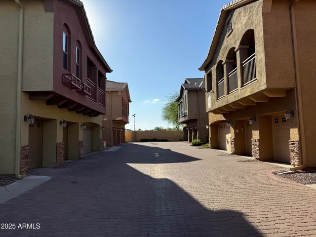 a view of a building with a street
