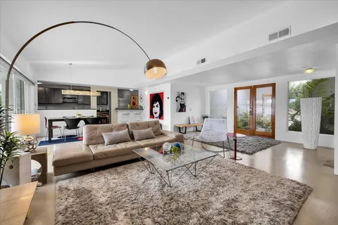 a view of a pathway both side of house