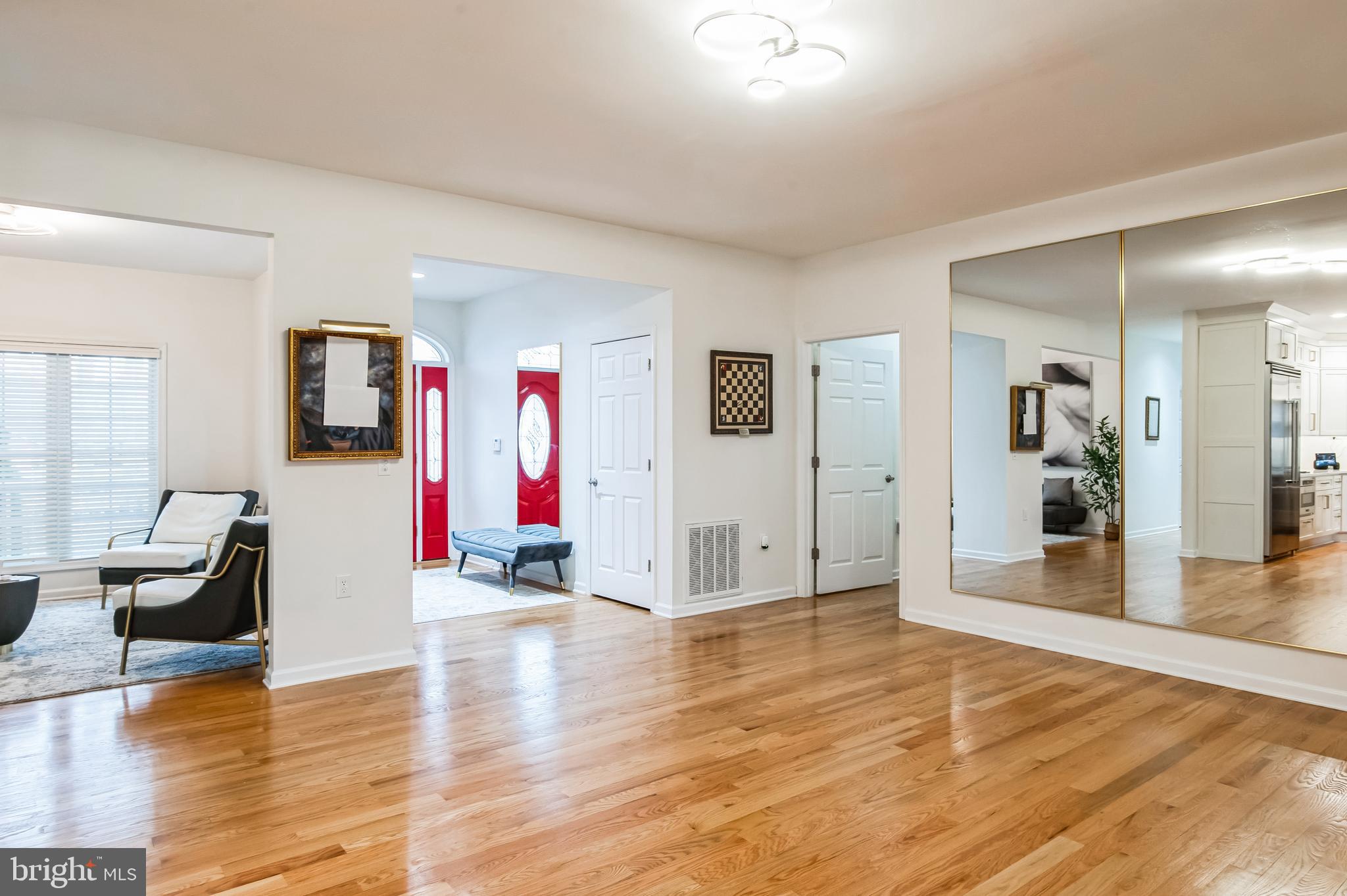 8419 Ingleton Road Easton, MD 21601 - Photo 12 of 58 a view of a livingroom with furniture and wooden floor