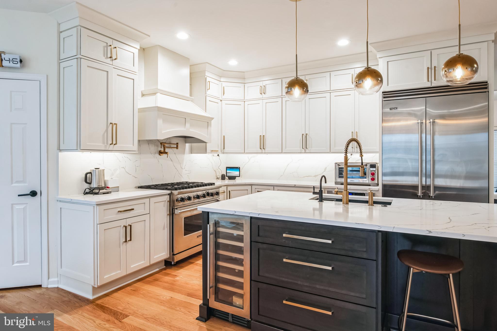 8419 Ingleton Road Easton, MD 21601 - Photo 15 of 58 a kitchen with a sink stainless steel appliances and cabinets