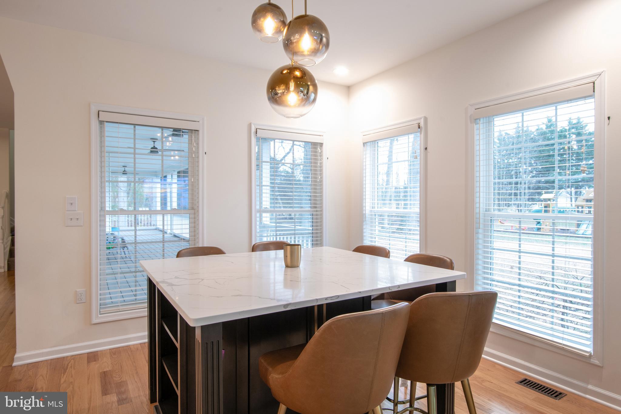 8419 Ingleton Road Easton, MD 21601 - Photo 20 of 58 a view of a dining room with furniture and window