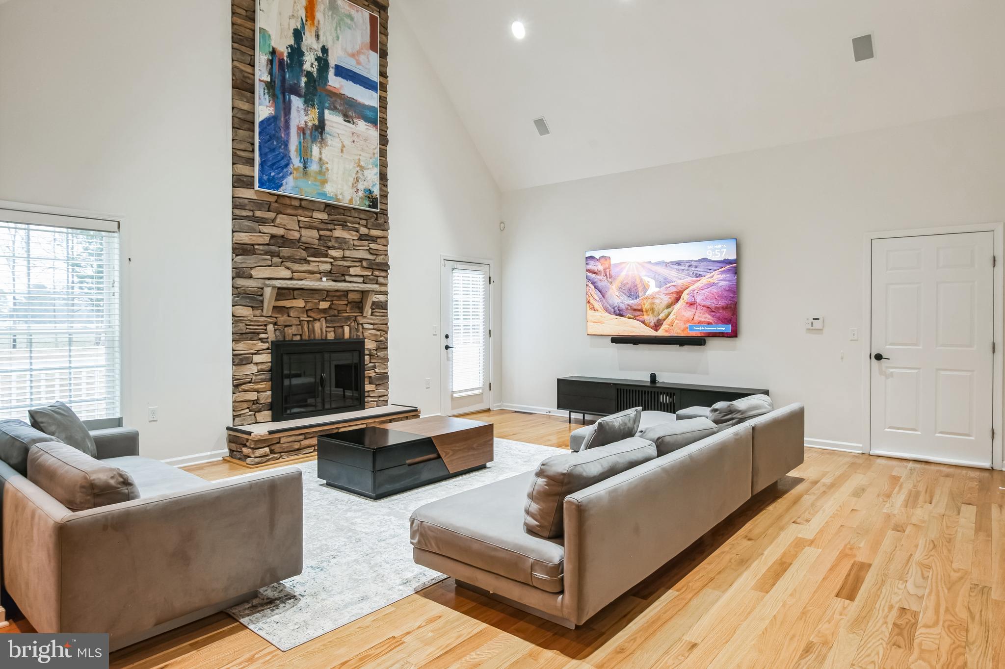 8419 Ingleton Road Easton, MD 21601 - Photo 22 of 58 a living room with furniture and a flat screen tv