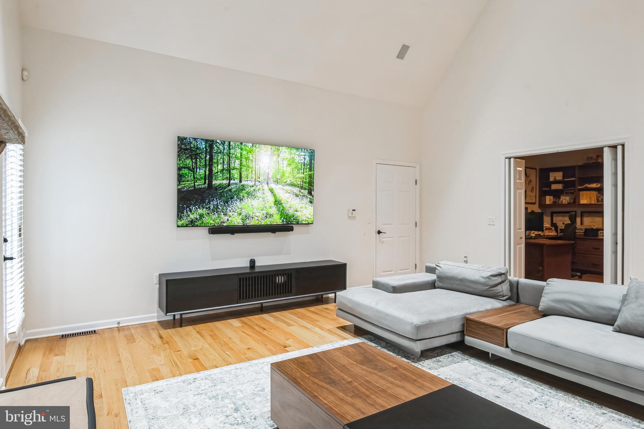 8419 Ingleton Road Easton, MD 21601 - Photo 23 of 58 a living room with couch and a flat screen tv