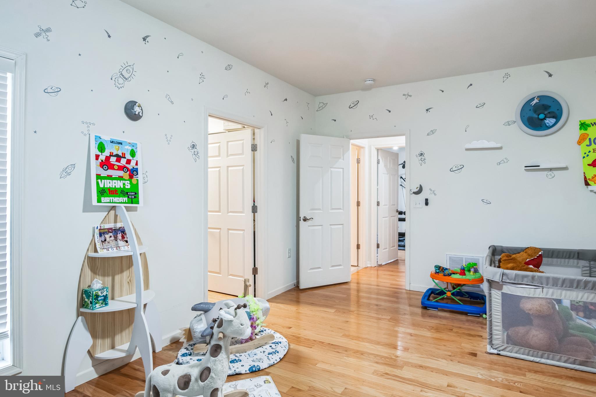 8419 Ingleton Road Easton, MD 21601 - Photo 26 of 58 a living room with furniture and a wooden floor