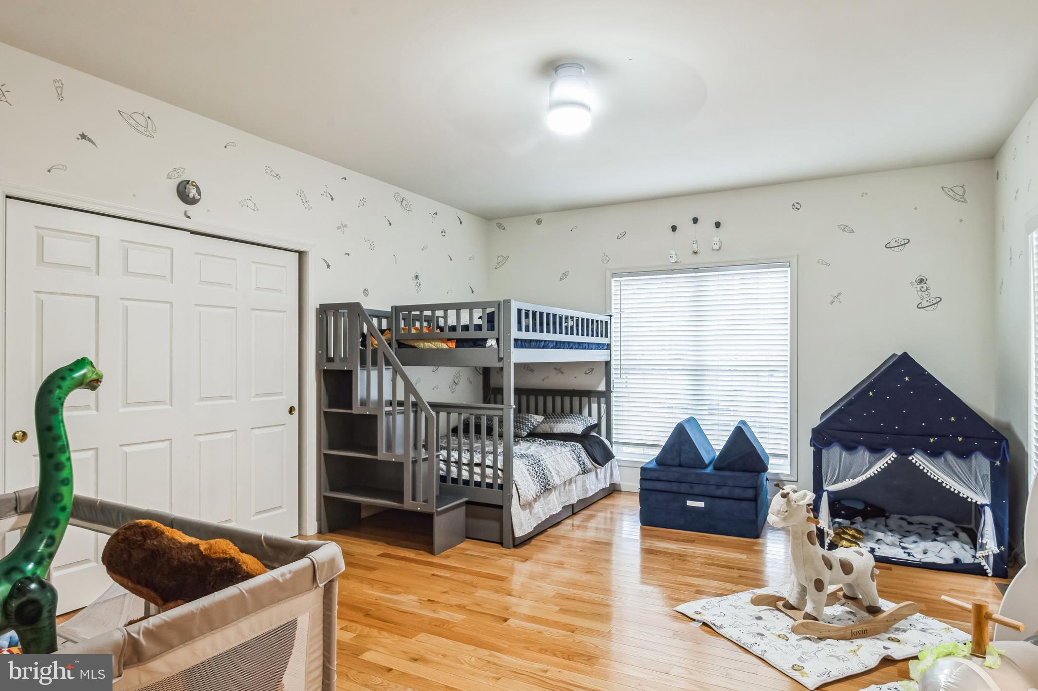 8419 Ingleton Road Easton, MD 21601 - Photo 27 of 58 a bedroom with furniture and a window