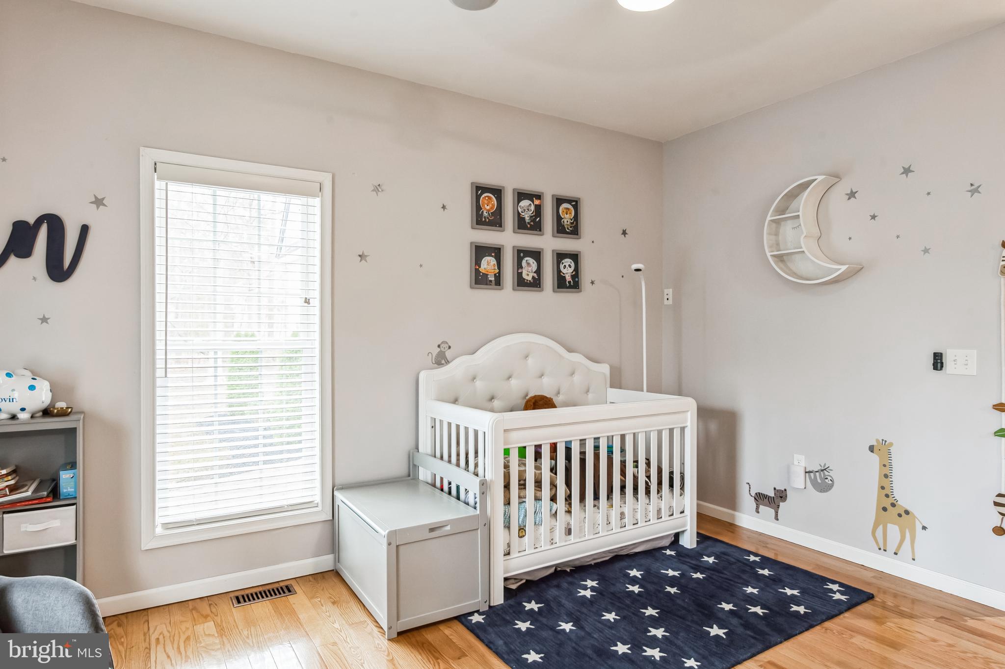 8419 Ingleton Road Easton, MD 21601 - Photo 32 of 58 a bedroom with furniture and a window