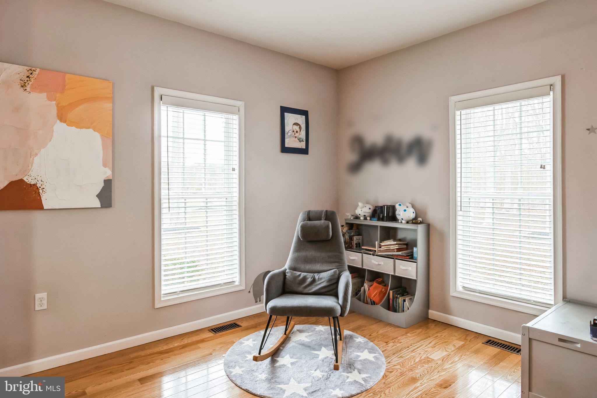 8419 Ingleton Road Easton, MD 21601 - Photo 33 of 58 a living room with furniture and a window