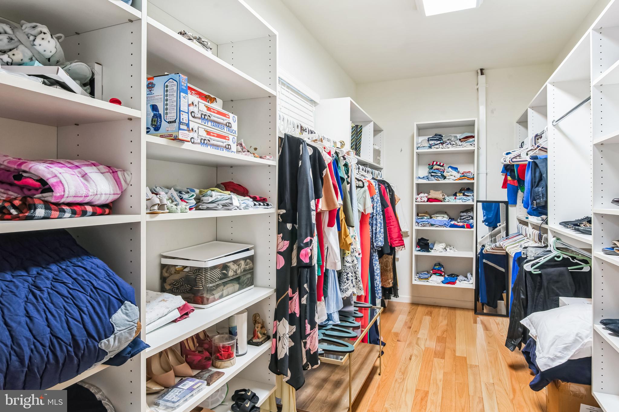 8419 Ingleton Road Easton, MD 21601 - Photo 39 of 58 a view of walk in closet with clothes and shoes