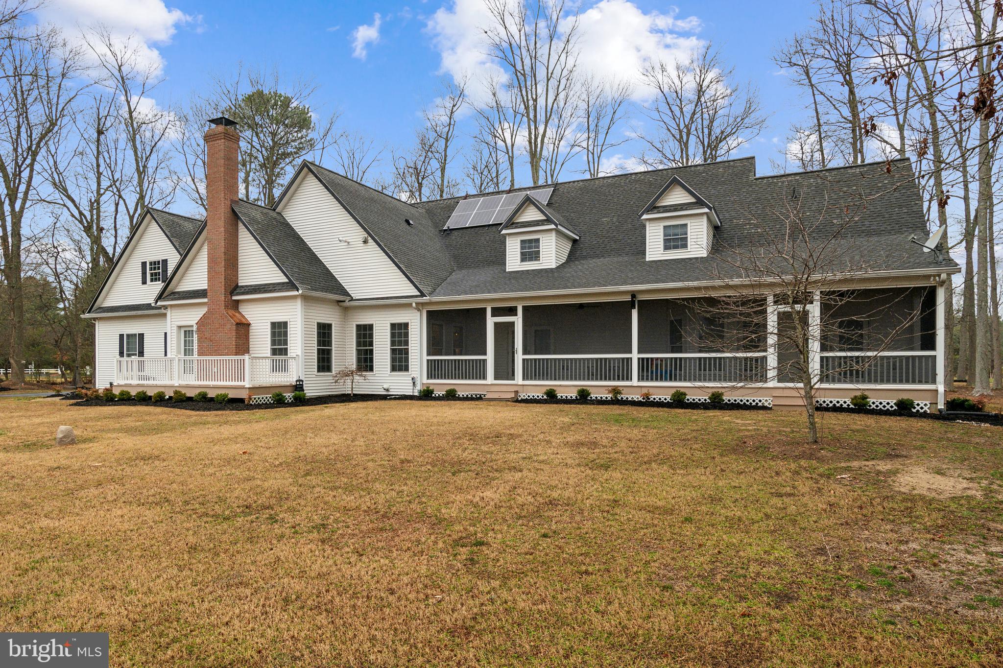 8419 Ingleton Road Easton, MD 21601 - Photo 4 of 58 a view of a house with a yard and garage