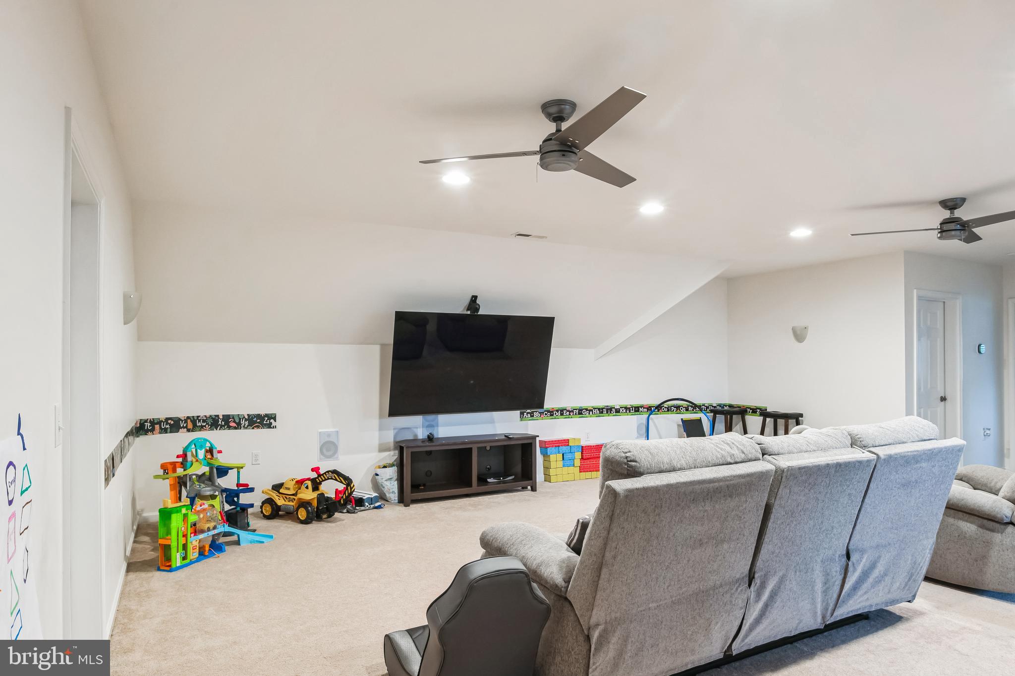 8419 Ingleton Road Easton, MD 21601 - Photo 42 of 58 a living room with furniture and a flat screen tv