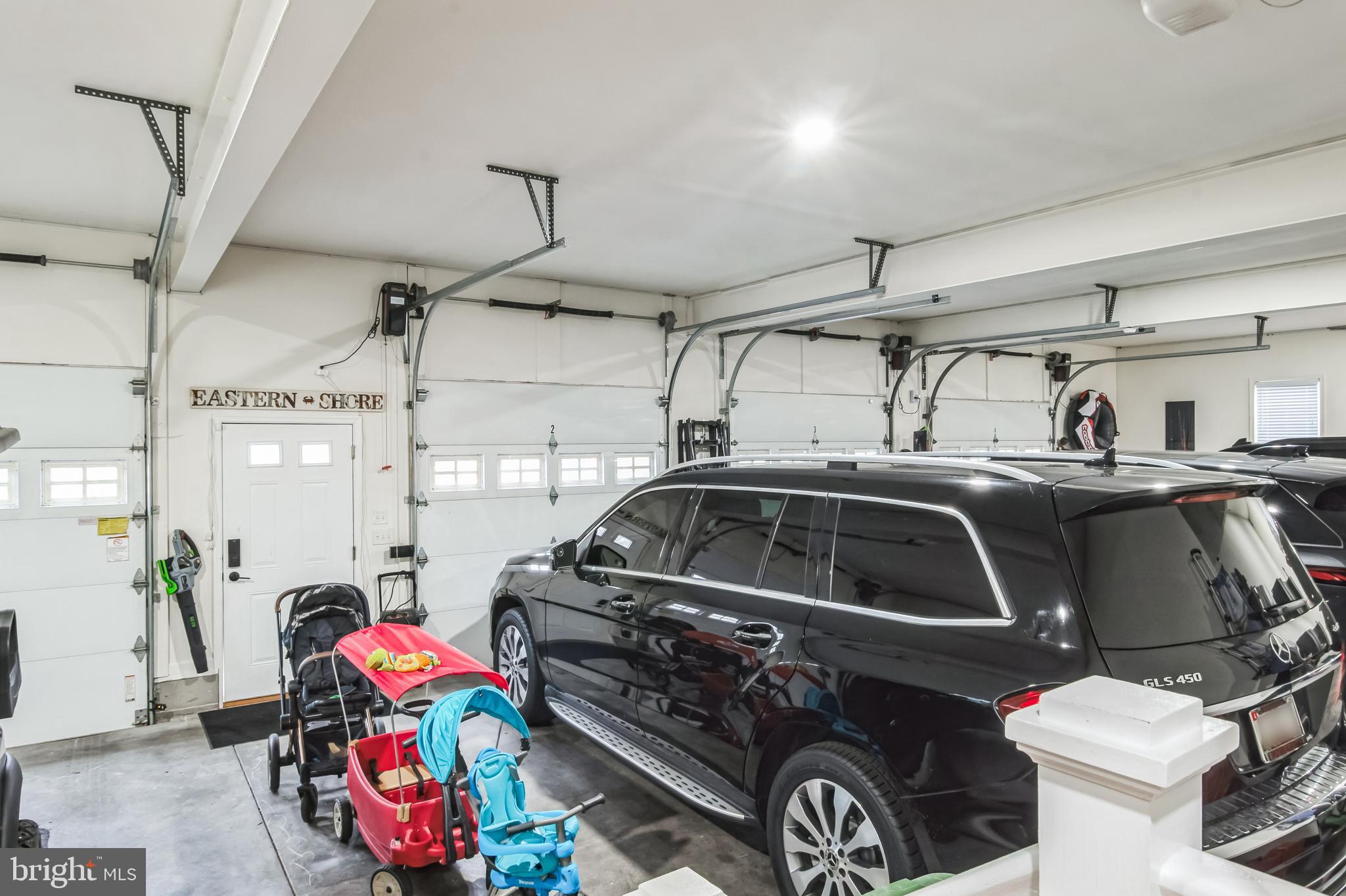 8419 Ingleton Road Easton, MD 21601 - Photo 48 of 58 Side-mount Garage Door openers. allow space for 6