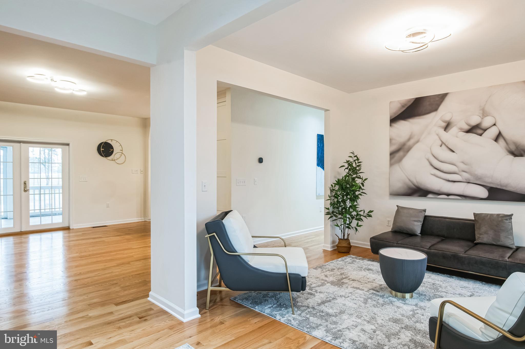 8419 Ingleton Road Easton, MD 21601 - Photo 9 of 58 a living room with furniture and wooden floor