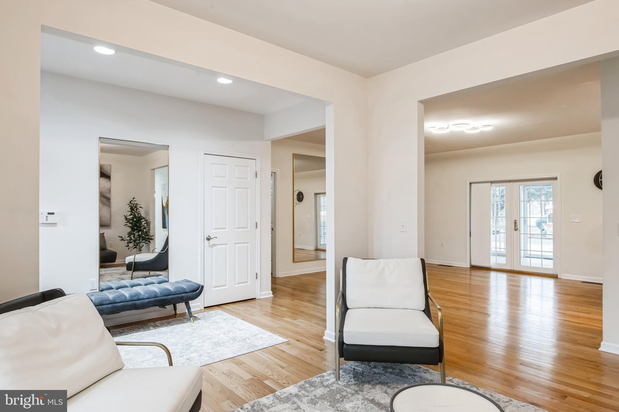 8419 Ingleton Road Easton, MD 21601 - Photo 10 of 58 a living room with furniture and wooden floor