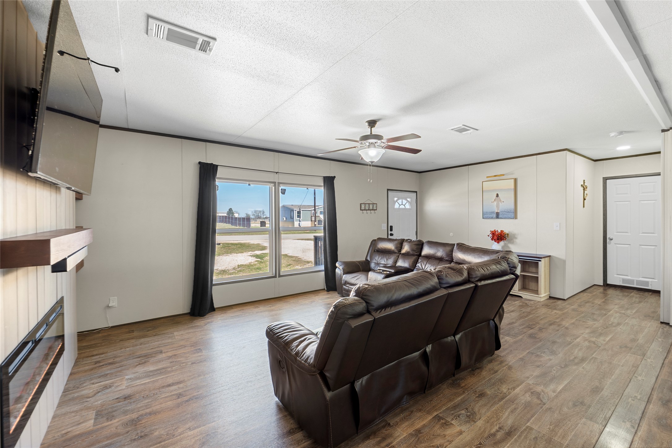 22774 Windy Mdws Cove Jarrell, TX 76537 - Photo 13 of 30 a living room with furniture and a window