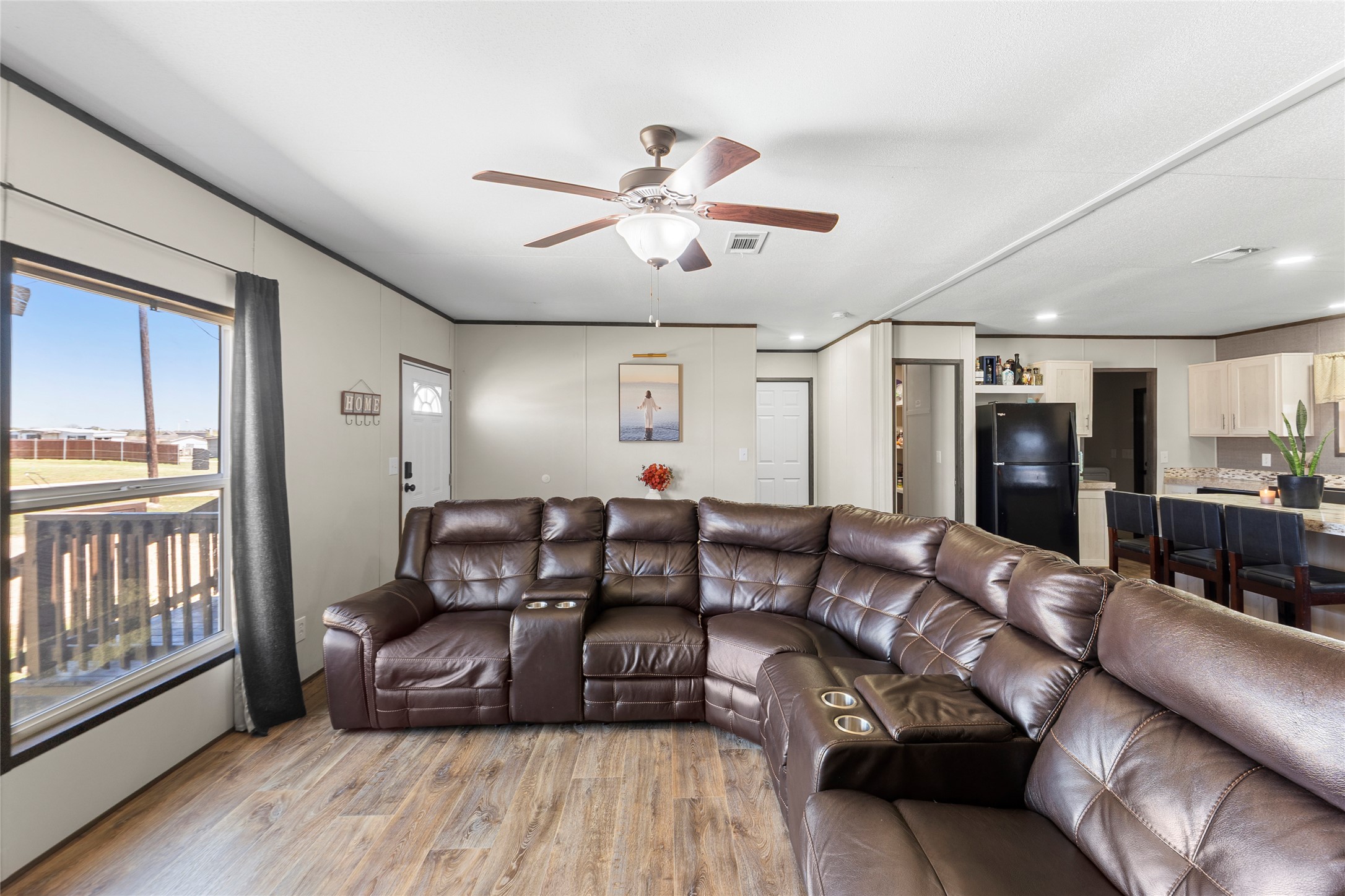 22774 Windy Mdws Cove Jarrell, TX 76537 - Photo 14 of 30 a living room with furniture and a large window