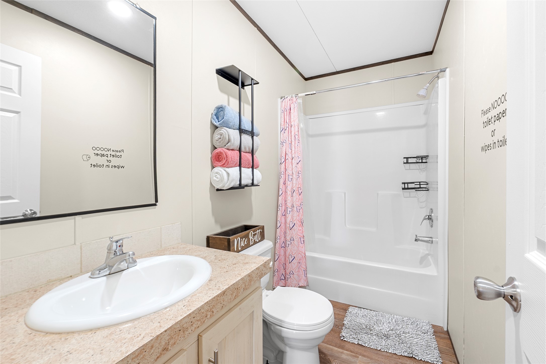 22774 Windy Mdws Cove Jarrell, TX 76537 - Photo 19 of 30 a bathroom with a sink toilet and shower