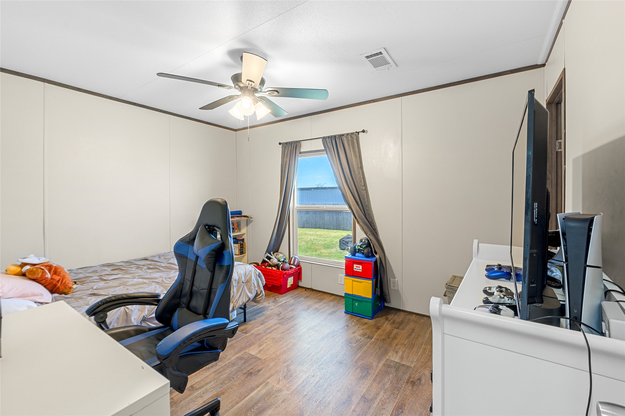 22774 Windy Mdws Cove Jarrell, TX 76537 - Photo 22 of 30 a view of a room with gym equipment