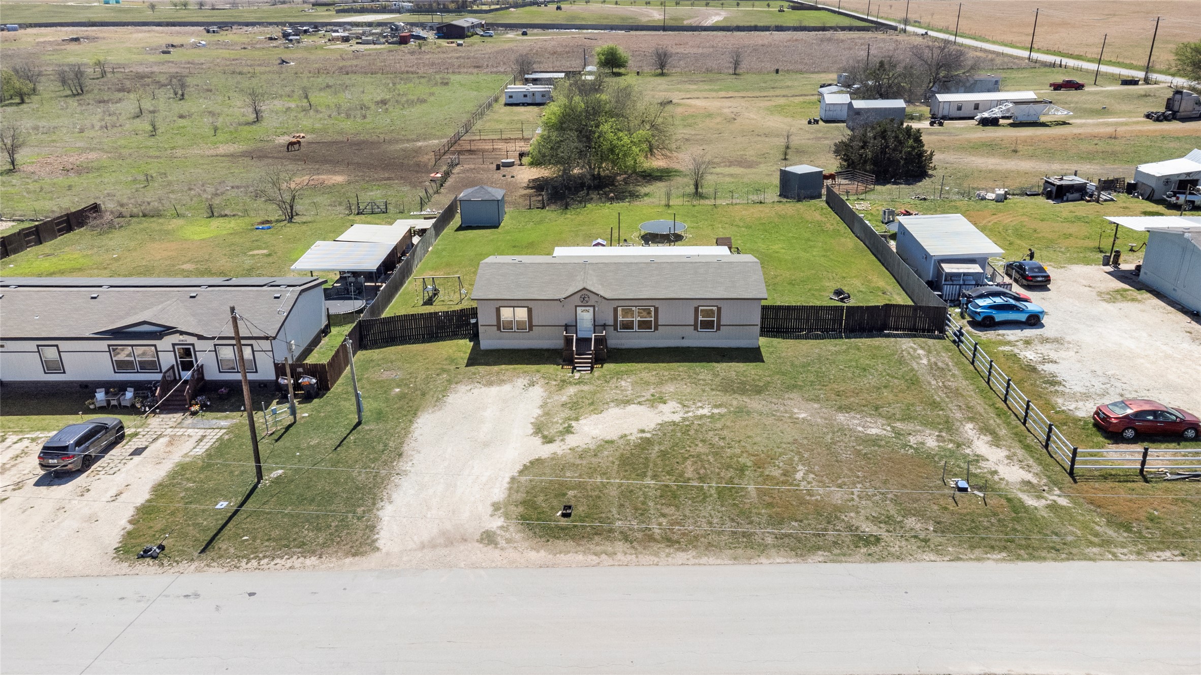 22774 Windy Mdws Cove Jarrell, TX 76537 - Photo 25 of 30 a view of a swimming pool with a patio