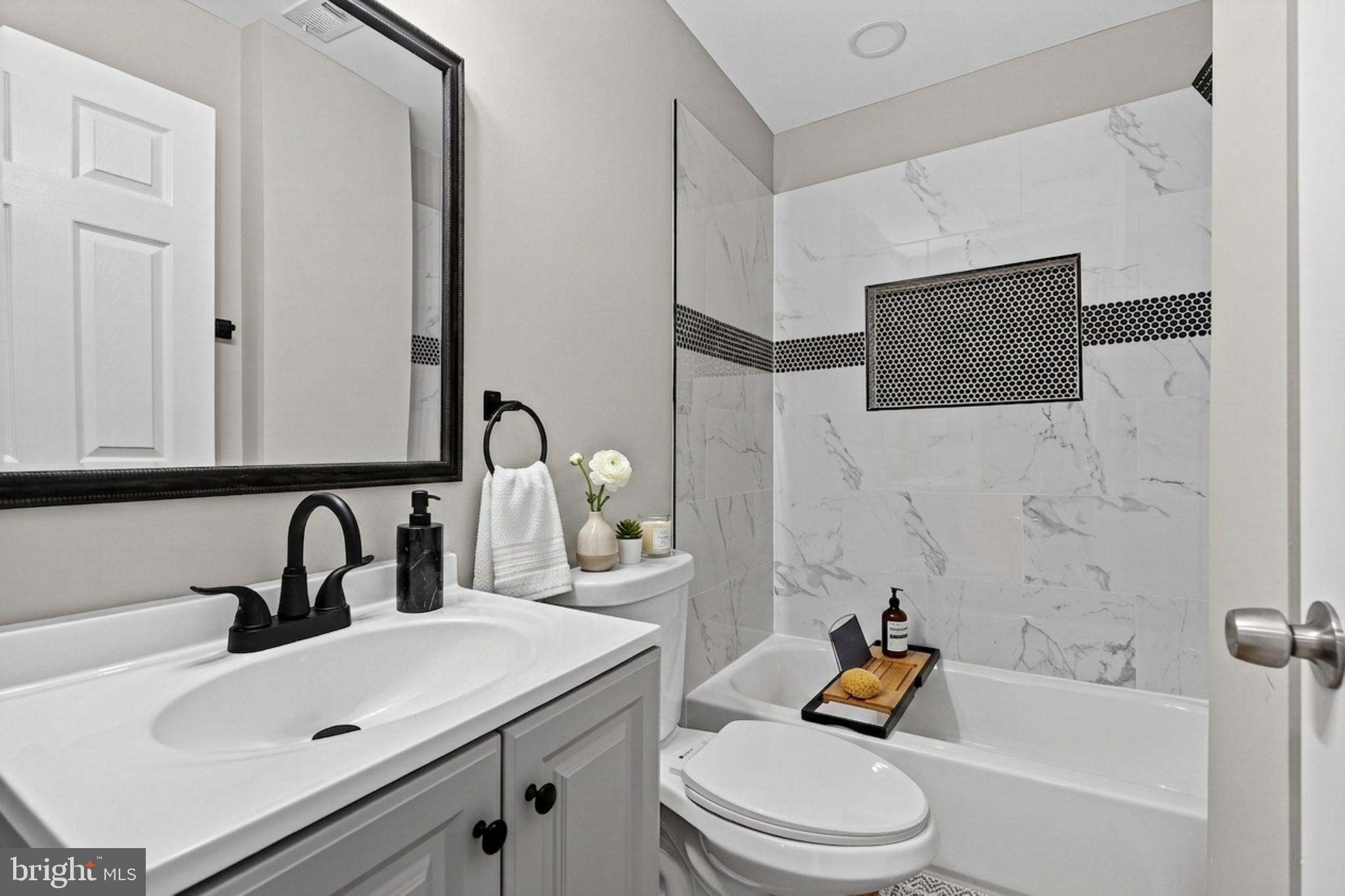 2001 North Fulton Avenue Baltimore, MD 21217 - Photo 14 of 28 a bathroom with a sink toilet and shower