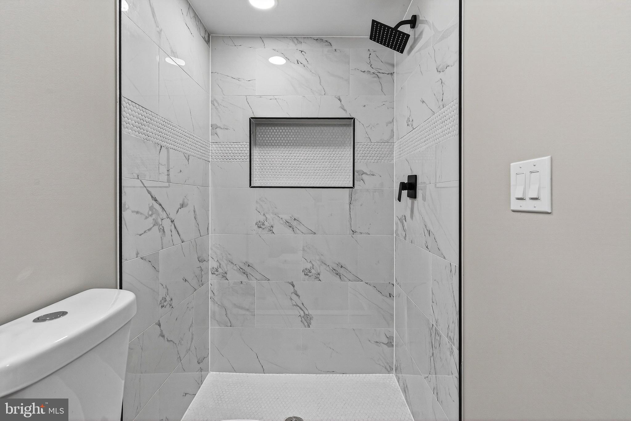 2001 North Fulton Avenue Baltimore, MD 21217 - Photo 25 of 28 a bathroom with a shower