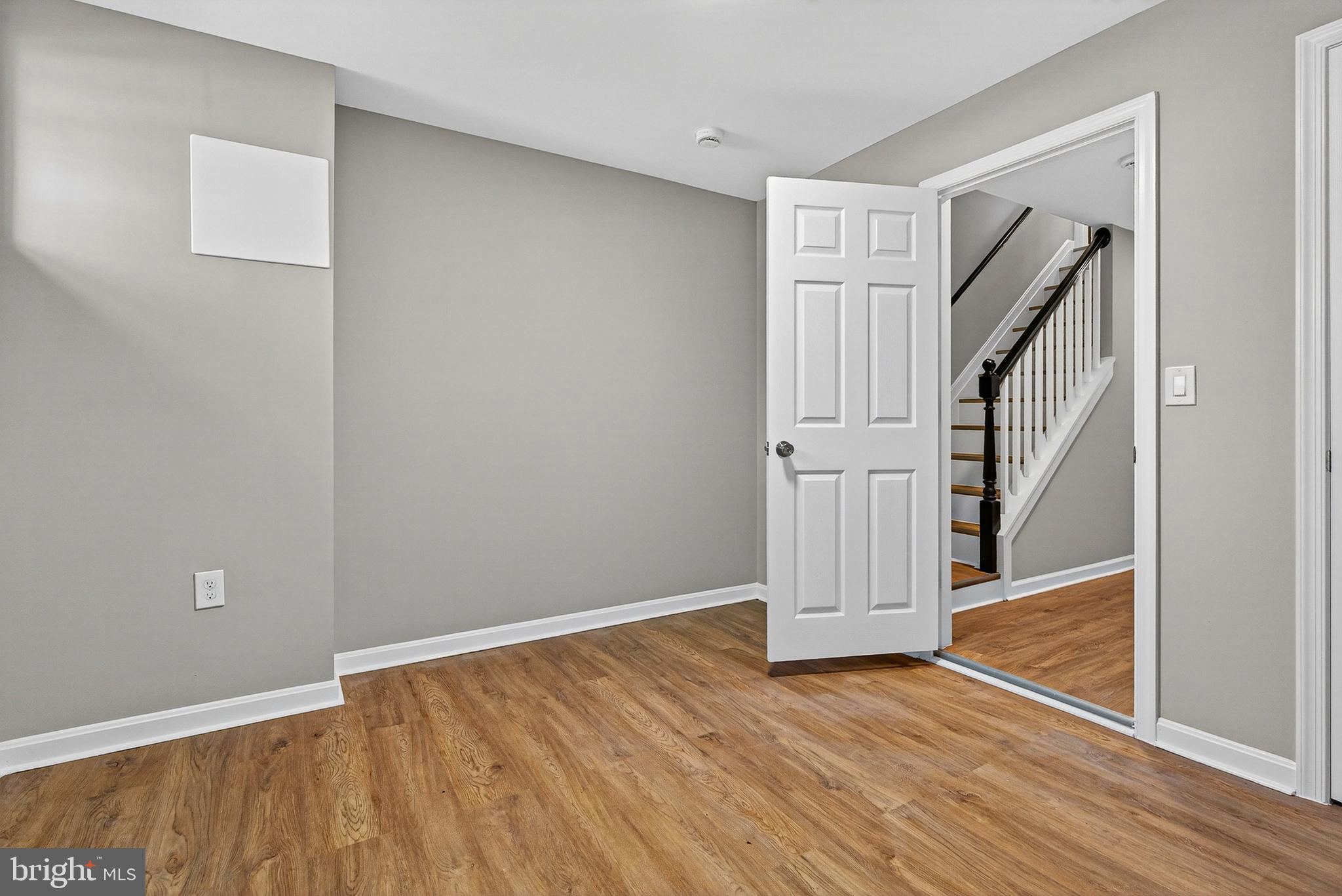2001 North Fulton Avenue Baltimore, MD 21217 - Photo 27 of 28 wooden floor in an empty room