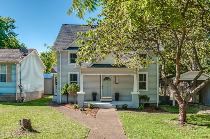 508 Dupont Avenue Madison, TN 37115 - Photo 21 of 22 a view of a house with backyard sitting area and garden