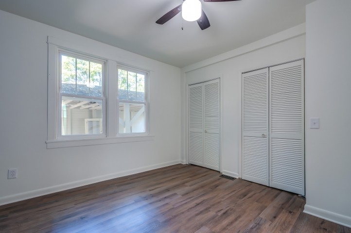508 Dupont Avenue Madison, TN 37115 - Photo 5 of 22 a view of an empty room with wooden floor and a window
