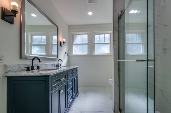 508 Dupont Avenue Madison, TN 37115 - Photo 6 of 22 a bathroom with a double vanity sink and mirror