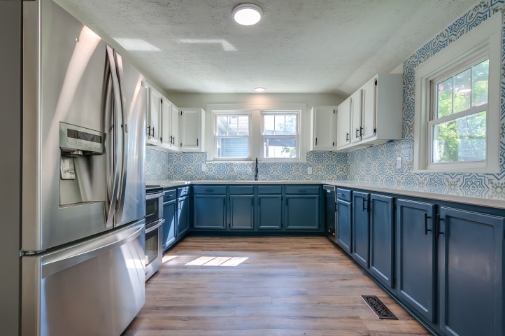 508 Dupont Avenue Madison, TN 37115 - Photo 10 of 22 a kitchen with stainless steel appliances granite countertop a refrigerator and a sink