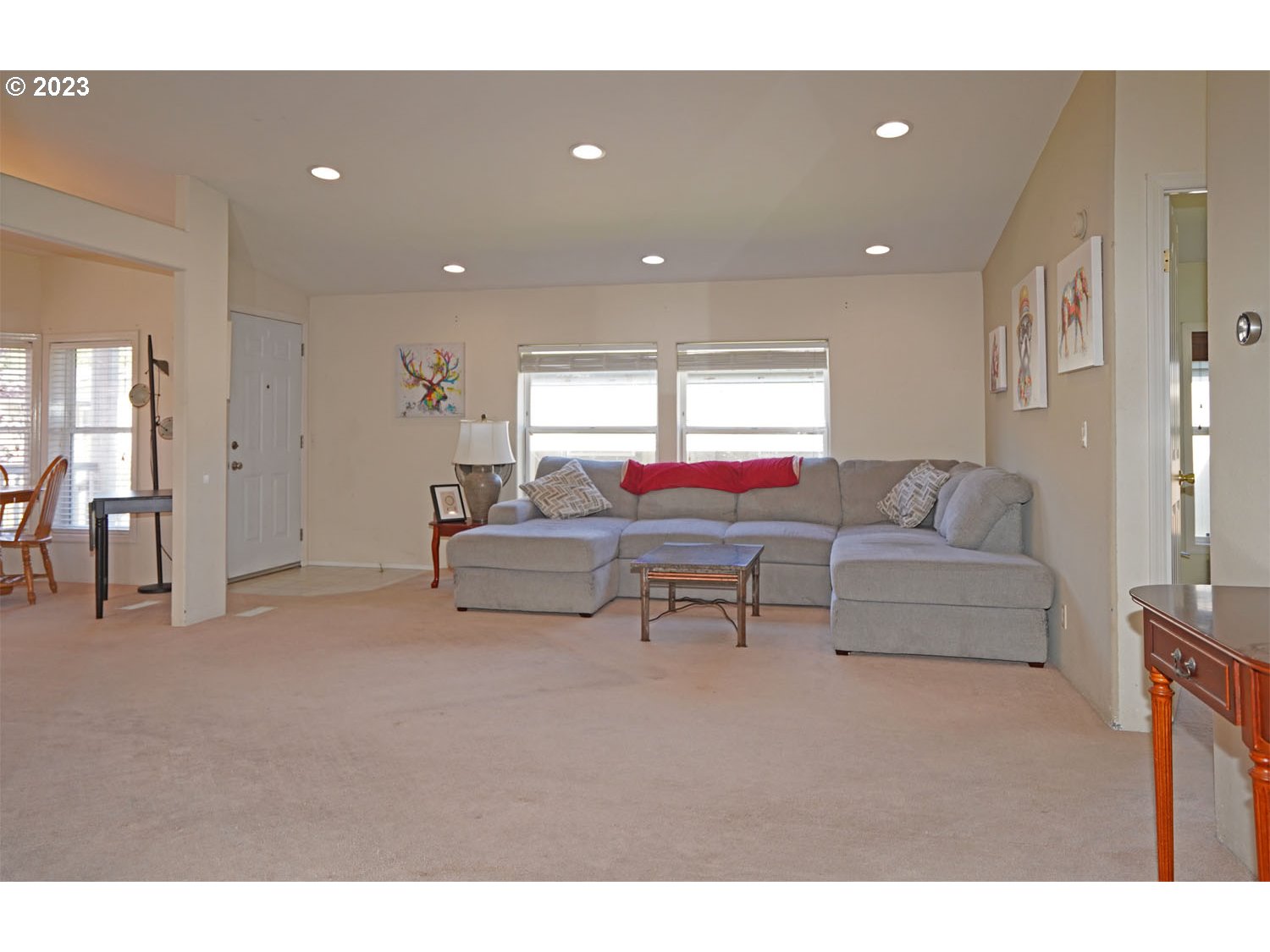 23077 Southwest Main Street, Unit 50 Sherwood, OR 97140 - Photo 11 of 24 a living room with furniture and a table