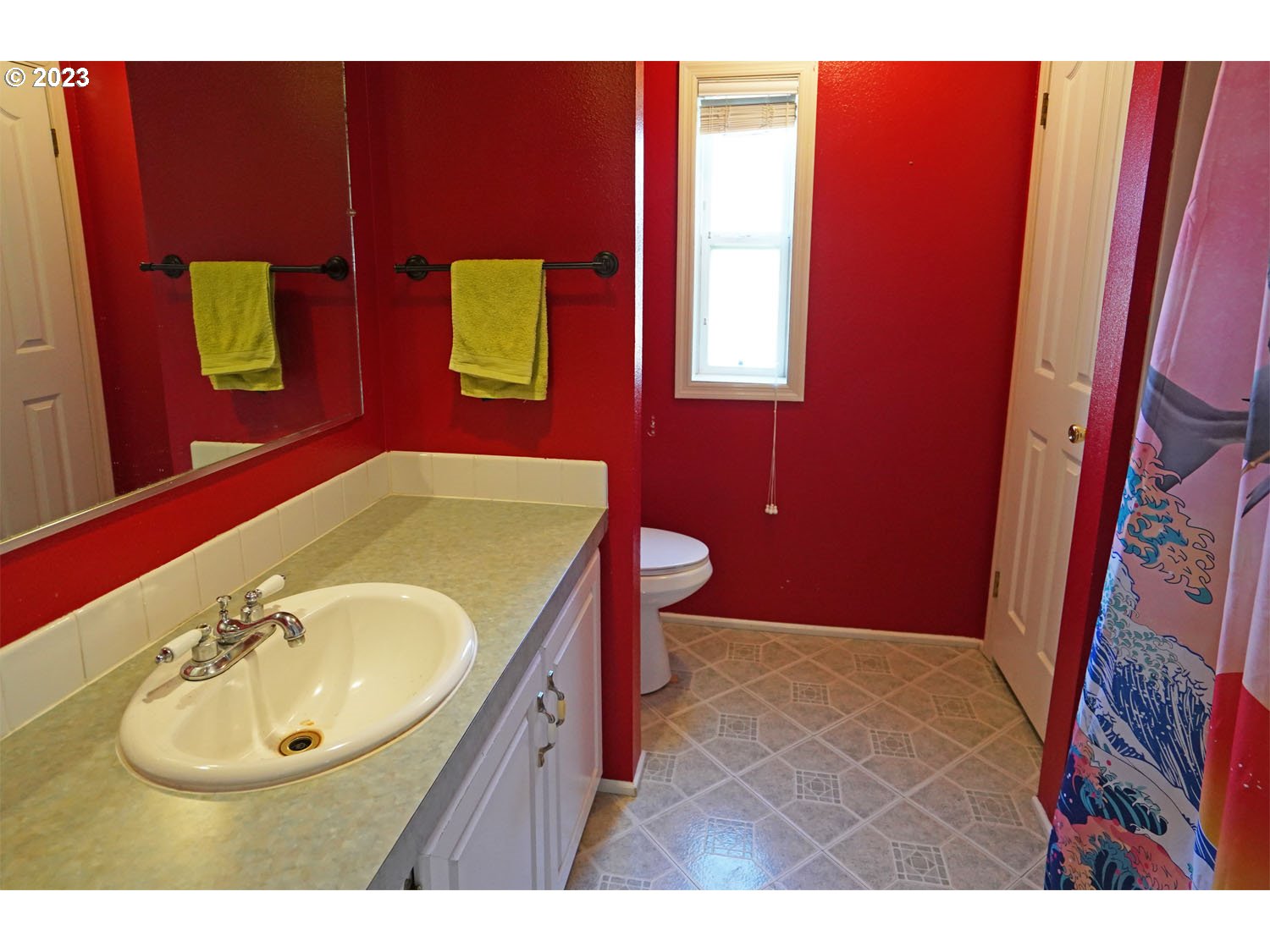 23077 Southwest Main Street, Unit 50 Sherwood, OR 97140 - Photo 21 of 24 a bathroom with a sink and a mirror