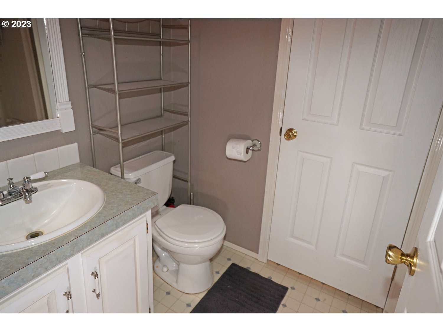 23077 Southwest Main Street, Unit 50 Sherwood, OR 97140 - Photo 23 of 24 a bathroom with a sink toilet and shower